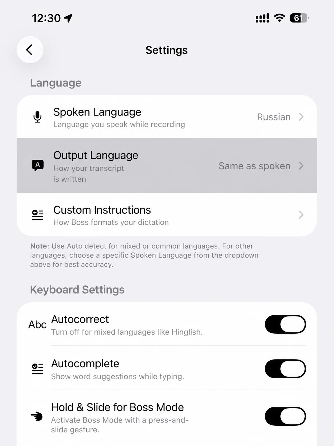 BossAI settings screen showing spoken language, output language, and custom instructions for dictation software for writers