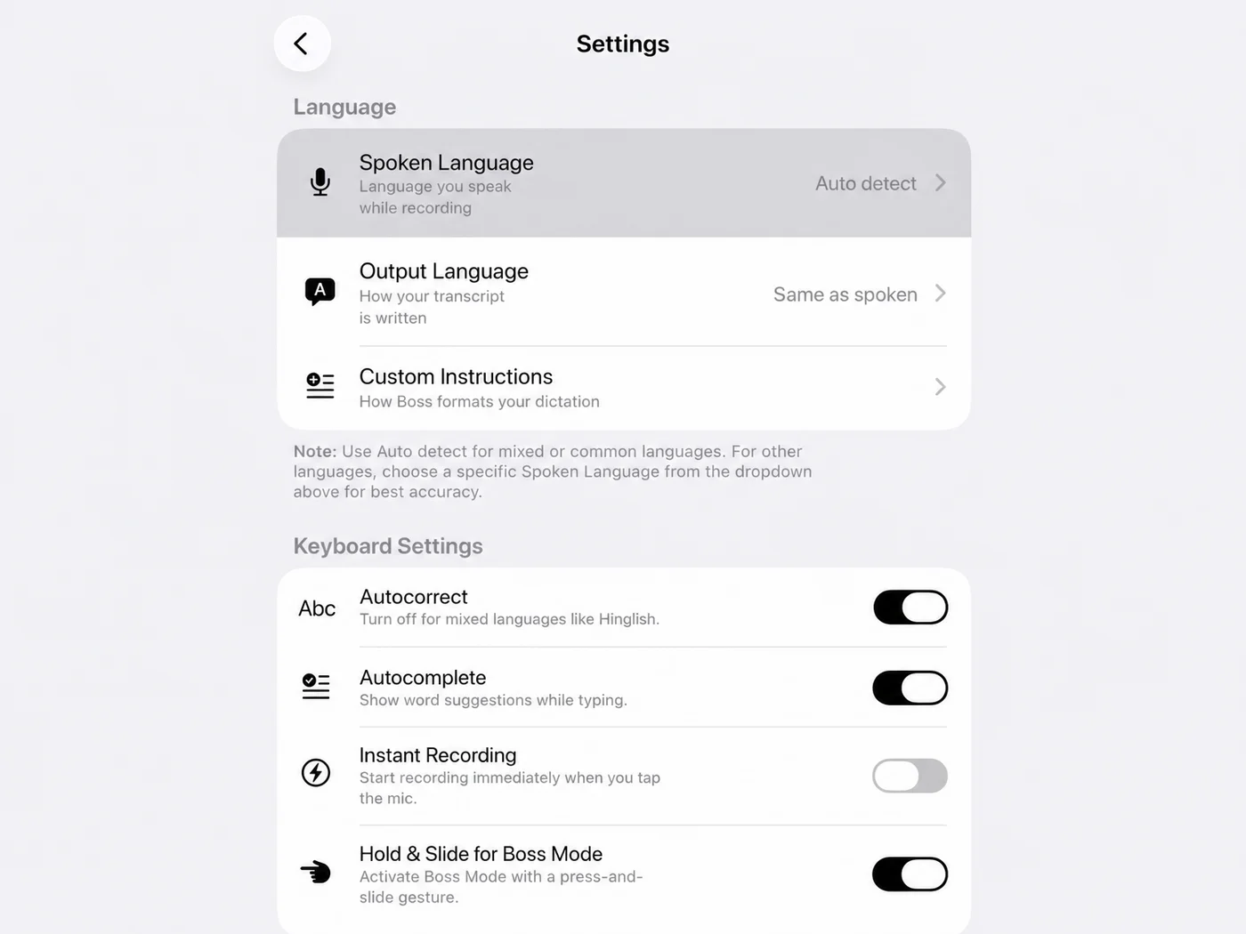 BossAI iOS settings screen showing spoken language, output language, custom instructions, and keyboard toggles for voice typing with rheumatoid arthritis